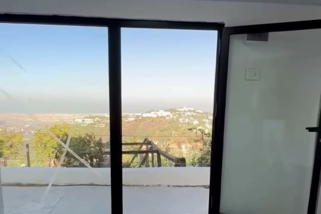 Living room opening to the view